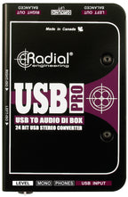 Radial Engineering USB-Pro DI box for professional audio, showing top view of the compact, metal-cased interface with input and output ports.