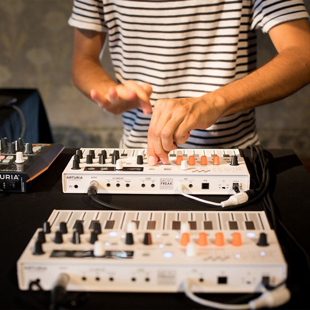 Arturia MicroFreak Vocoder Edition synthesizer with colorful keyboard and control panel, showcasing its versatile electronic music features.