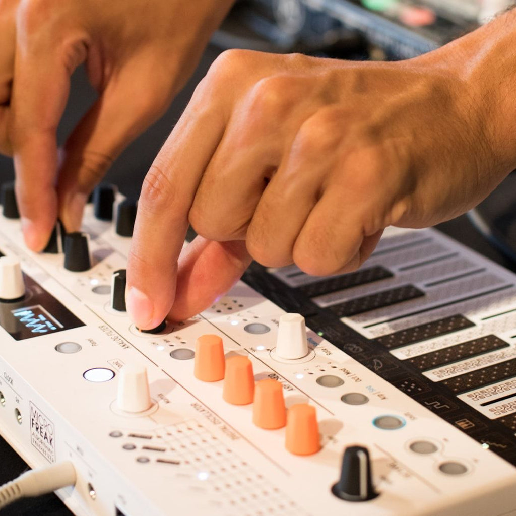 Arturia MicroFreak Vocoder Edition synthesizer with colorful keyboard and control panel, showcasing its compact design and vibrant interface.