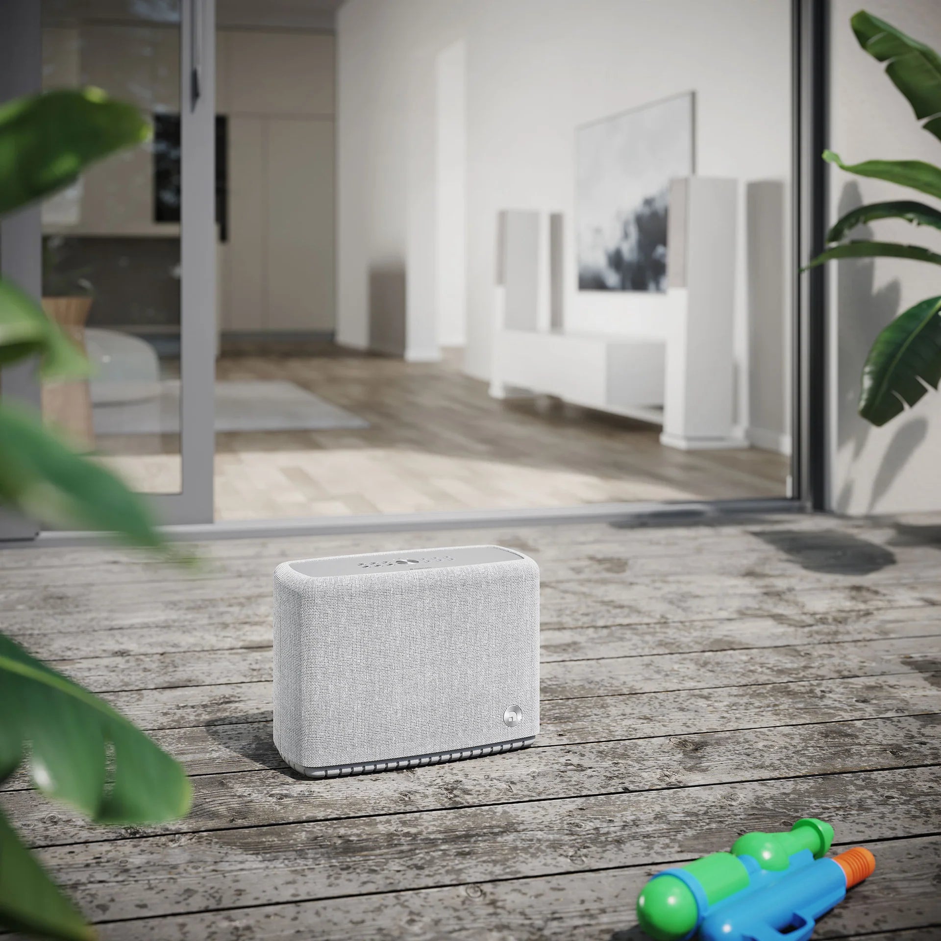 Light grey Audio Pro A15 portable speaker with wireless multiroom audio, AirPlay 2, Google Cast, and Chromecast features.