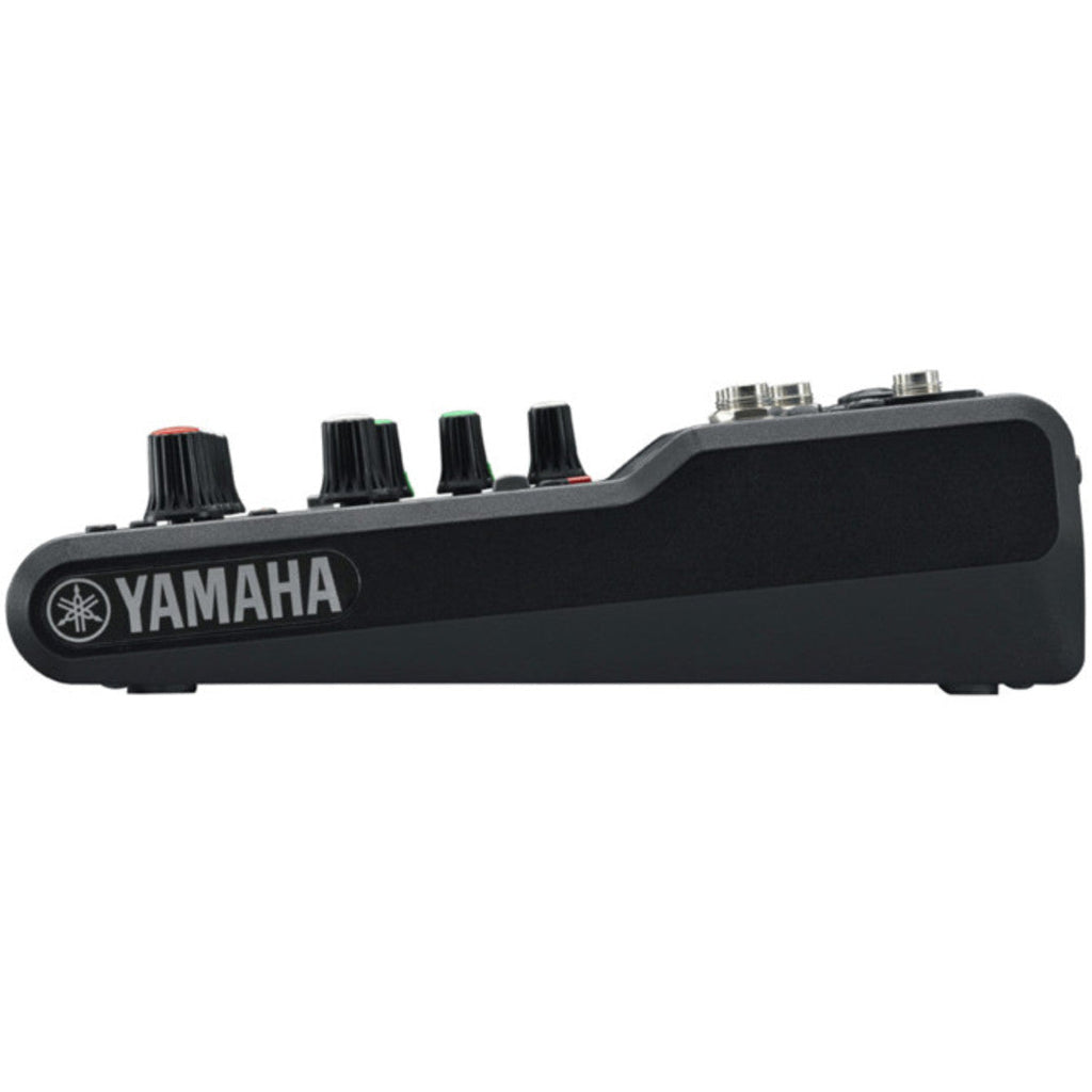 Yamaha MG06 analog mixer with two channels, knobs, and input jacks for audio mixing and sound control.