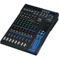 Yamaha MG12 analog mixer with multiple input channels and control knobs, used for professional audio mixing.